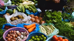 Fresh vegetables and herbs on a market