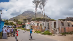 People in the street in Imizamo Yethu township in South Africa