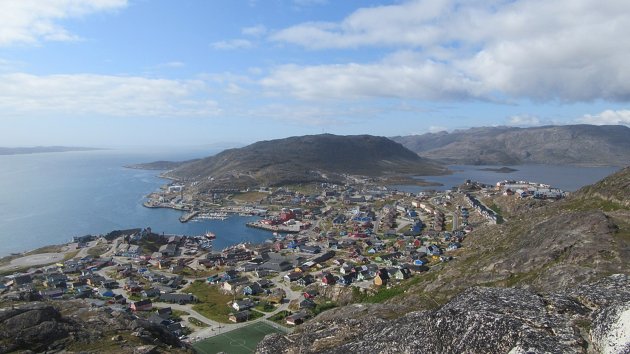 A town below a ridge overlooking Qarqotoq Greenland