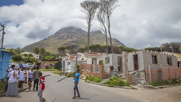 People in the street in Imizamo Yethu township in South Africa