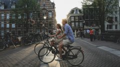 two cyclists in Amsterdam