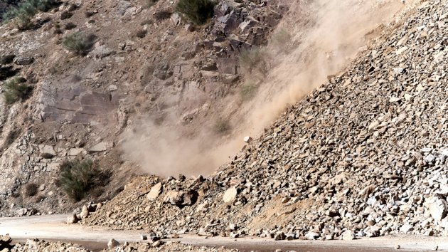 A landslide covering the road